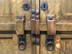 Wylie & Lochhead. A Large Arts & Crafts Oak Wardrobe With Stylised Iron Hinges - Thumbnail 4