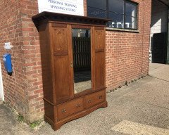 Liberty & Co, an Arts & Crafts Oak Double Wardrobe with Stylised Floral Inlays - Thumbnail 2