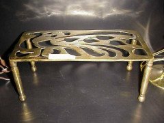 An Aesthetic Movement Brass Trivet with Peacock Fret Work, on Turned Legs - Thumbnail 1