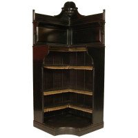 Collinson & Lock, attributed. An Ebonized Open Corner Cabinet