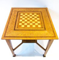 Liberty & Co attributed, An Arts & Crafts Oak Chess Table - Thumbnail 1