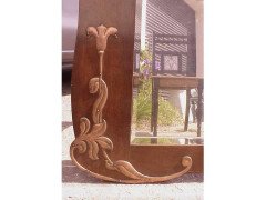 An Arts & Crafts Shaped Oak Bevelled Mirror with Stylised Floral Copper Details - Thumbnail 4