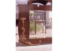 An Arts & Crafts Shaped Oak Bevelled Mirror with Stylised Floral Copper Details - Thumbnail 5