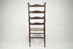 Liberty & Co., Style of C. F. A. Voysey. A Pair of Oak Rush Seat Ladderback Armchairs - Thumbnail 15