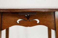 Liberty & Co., An Arts Crafts Oak Oval Top Side Table - Thumbnail 15