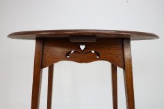 Liberty & Co., An Arts Crafts Oak Oval Top Side Table - Thumbnail 16