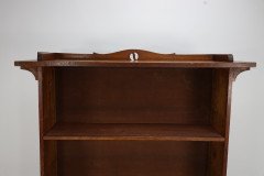 Wylie and Lochhead (attributed). an Arts & Crafts Oak Bookcase with Ying- Yang Detail to the Top & Adjustable Shelves - Thumbnail 13