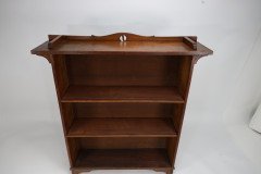 Wylie and Lochhead (attributed). an Arts & Crafts Oak Bookcase with Ying- Yang Detail to the Top & Adjustable Shelves - Thumbnail 14