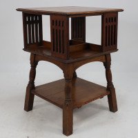 Liberty & Co. An Arts & Crafts Oak Revolving Bookcase Table on Square Turned Legs - Thumbnail 1
