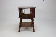 Liberty & Co. An Arts & Crafts Oak Revolving Bookcase Table on Square Turned Legs - Thumbnail 4