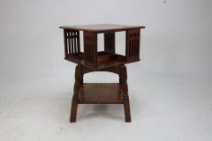 Liberty & Co. An Arts & Crafts Oak Revolving Bookcase Table on Square Turned Legs - Thumbnail 5