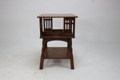Liberty & Co. An Arts & Crafts Oak Revolving Bookcase Table on Square Turned Legs - Thumbnail 6