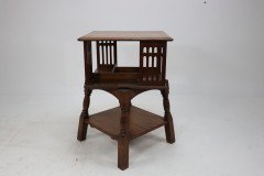 Liberty & Co. An Arts & Crafts Oak Revolving Bookcase Table on Square Turned Legs - Thumbnail 7