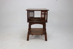 Liberty & Co. An Arts & Crafts Oak Revolving Bookcase Table on Square Turned Legs - Thumbnail 11