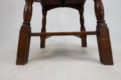 Liberty & Co. An Arts & Crafts Oak Revolving Bookcase Table on Square Turned Legs - Thumbnail 12