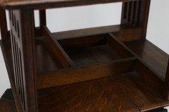 Liberty & Co. An Arts & Crafts Oak Revolving Bookcase Table on Square Turned Legs - Thumbnail 14