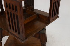 Liberty & Co. An Arts & Crafts Oak Revolving Bookcase Table on Square Turned Legs - Thumbnail 16