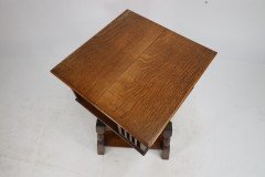 Liberty & Co. An Arts & Crafts Oak Revolving Bookcase Table on Square Turned Legs - Thumbnail 18