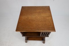 Liberty & Co. An Arts & Crafts Oak Revolving Bookcase Table on Square Turned Legs - Thumbnail 19