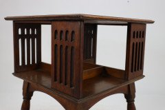 Liberty & Co. An Arts & Crafts Oak Revolving Bookcase Table on Square Turned Legs - Thumbnail 20