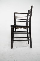 William Morris, an Arts and Crafts Ebonised Rush Seat Sussex Armchair - Thumbnail 7