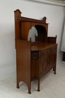 Liberty & Co., attributed. An English Arts & Crafts Oak Sideboard with Carved Decoration - Thumbnail 3