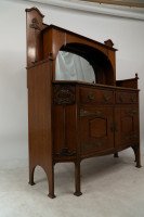 Liberty & Co., attributed. An English Arts & Crafts Oak Sideboard with Carved Decoration - Thumbnail 4