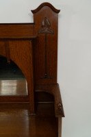 Liberty & Co., attributed. An English Arts & Crafts Oak Sideboard with Carved Decoration - Thumbnail 8