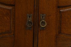 Liberty & Co., attributed. An English Arts & Crafts Oak Sideboard with Carved Decoration - Thumbnail 13