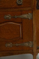 Liberty & Co., attributed. An English Arts & Crafts Oak Sideboard with Carved Decoration - Thumbnail 15