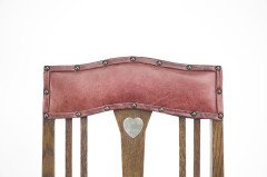 Liberty & Co., attributed. An Arts & Crafts Oak Chair with Shaped Padded Headrest & Pewter Heart Inlay - Thumbnail 6