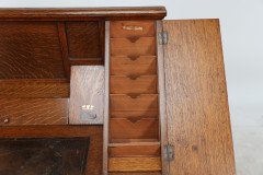 G. M. Ellwood for J. S. Henry. an Arts & Crafts Oak Writing Desk - Thumbnail 12