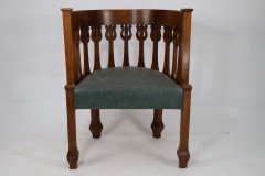 An Arts and Crafts Oak Armchair with Stylized Floral Upright Decoration - Thumbnail 2