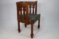 An Arts and Crafts Oak Armchair with Stylized Floral Upright Decoration - Thumbnail 4