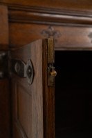Arts & Crafts Oak Linen Press by Liberty and Co with Fleur De Lys carved details - Thumbnail 16