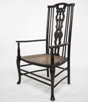 Liberty & Co attributed. A Queen Anne style fretwork back cane seat armchair - Thumbnail 1
