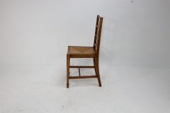 Heals of London, Attributed. an Arts & Crafts Oak Lattice Back Side Chair - Thumbnail 4