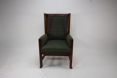Liberty and Co, attributed, in the style of Leonard Wyburd. An Arts and Crafts oak wing back armchair - Thumbnail 2