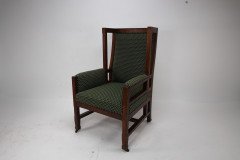 Liberty and Co, attributed, in the style of Leonard Wyburd. An Arts and Crafts oak wing back armchair - Thumbnail 3