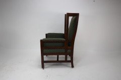 Liberty and Co, attributed, in the style of Leonard Wyburd. An Arts and Crafts oak wing back armchair - Thumbnail 4