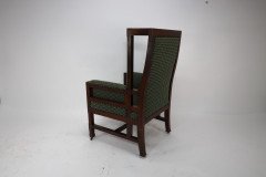 Liberty and Co, attributed, in the style of Leonard Wyburd. An Arts and Crafts oak wing back armchair - Thumbnail 6