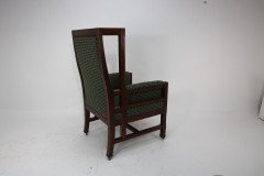 Liberty and Co, attributed, in the style of Leonard Wyburd. An Arts and Crafts oak wing back armchair - Thumbnail 7