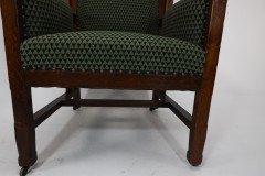 Liberty and Co, attributed, in the style of Leonard Wyburd. An Arts and Crafts oak wing back armchair - Thumbnail 15