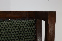Liberty and Co, attributed, in the style of Leonard Wyburd. An Arts and Crafts oak wing back armchair - Thumbnail 10