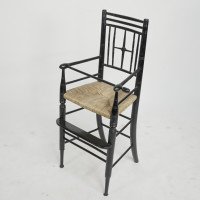 Liberty & Co. An Argyle Aesthetic Movement ebonized rush seat child's high chair - Thumbnail 1