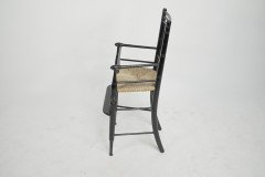 Liberty & Co. An Argyle Aesthetic Movement ebonized rush seat child's high chair - Thumbnail 3
