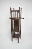 An Anglo-Japanese style mahogany side cabinet of slender form with brass sabots - Thumbnail 3