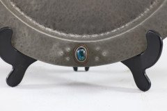Liberty and Co (attributed). An Arts & Crafts hand hammered pewter plate with five blue enamel jewels - Thumbnail 7