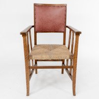 Liberty & Co., An Arts & Crafts Rush Seat Armchair with a Shaped Back - Thumbnail 2