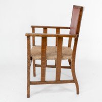 Liberty & Co., An Arts & Crafts Rush Seat Armchair with a Shaped Back - Thumbnail 5